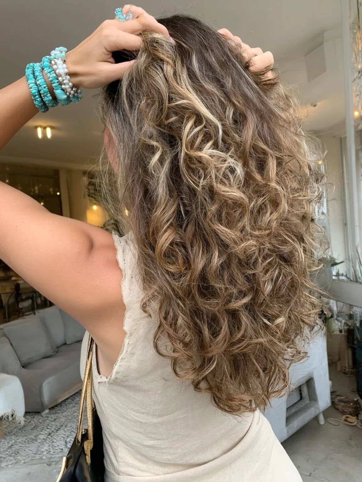 High-Volume Long Curly Layers with Honey Blonde and Caramel